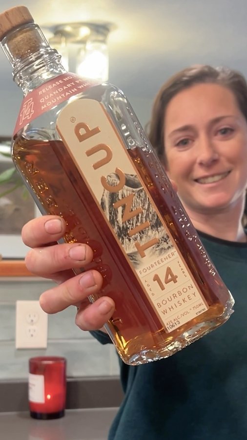 Instagram post by @mo.in.mountains for TINCUP Whiskey. Caption reads: What are you bringing to Thanksgiving? How about a....