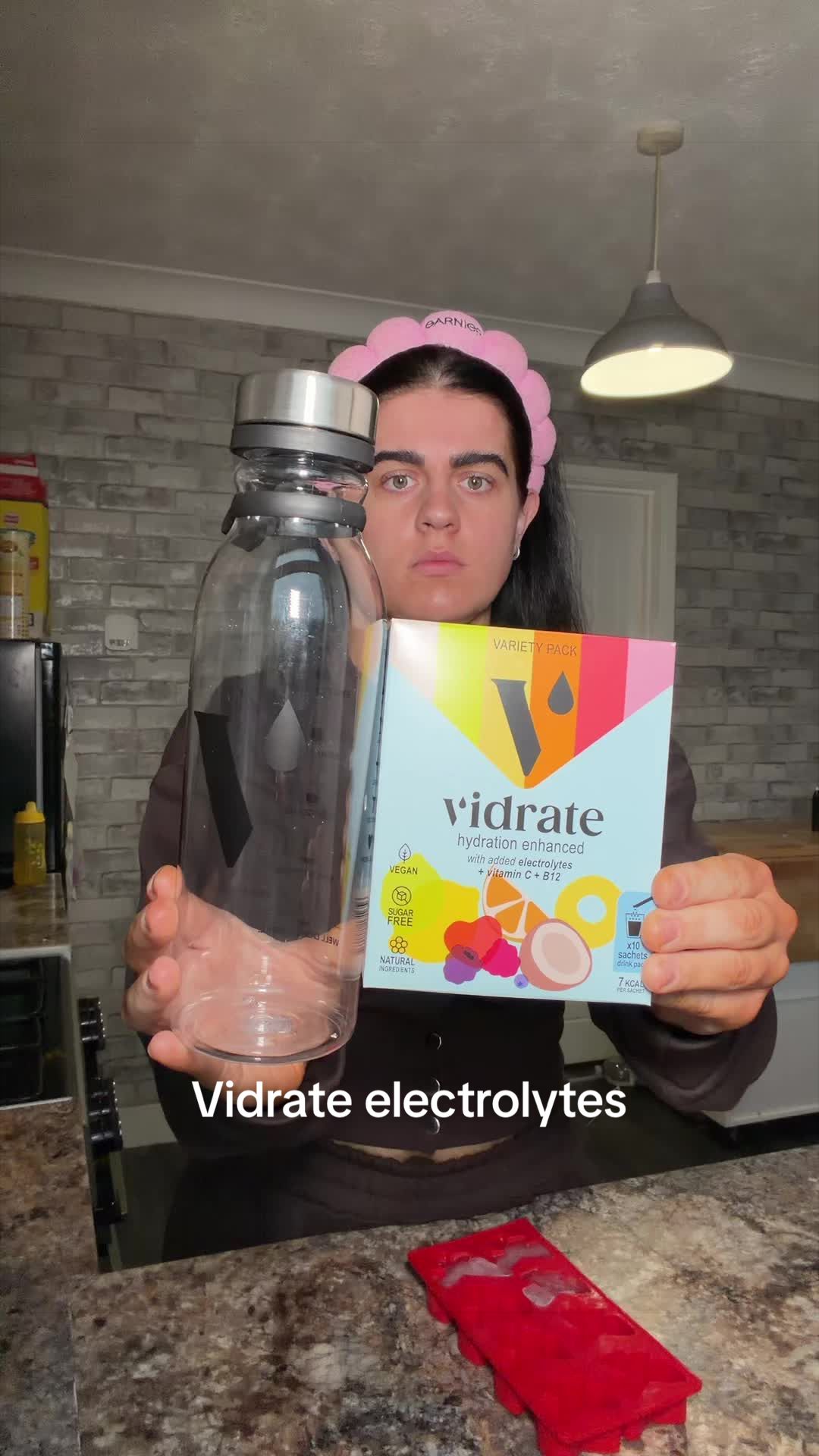 TikTok post by @emmafayedocherty for ViDrate. Caption reads: Vidrate electrolytes are my fav 🍊🍉🍏🍓🍒 [...].