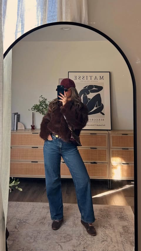 Instagram post by @daniellee_esther for American Eagle. Caption reads: Immediately brings out the fur when there’s a....