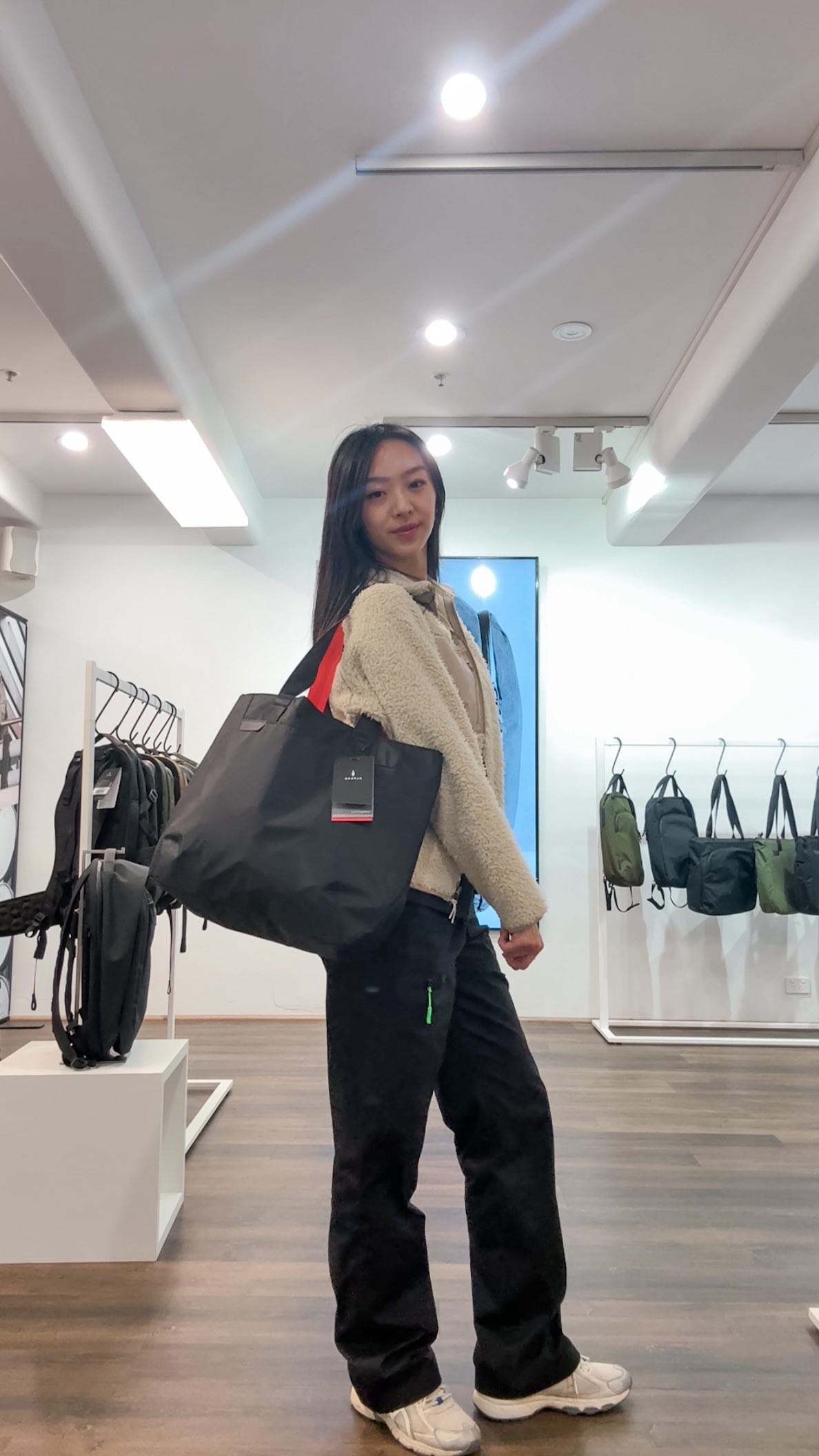 Instagram post by @tiffanys.album for ALPAKA. Caption reads: 💼✈️ melbourne pop-up @alpakagear this week only -....