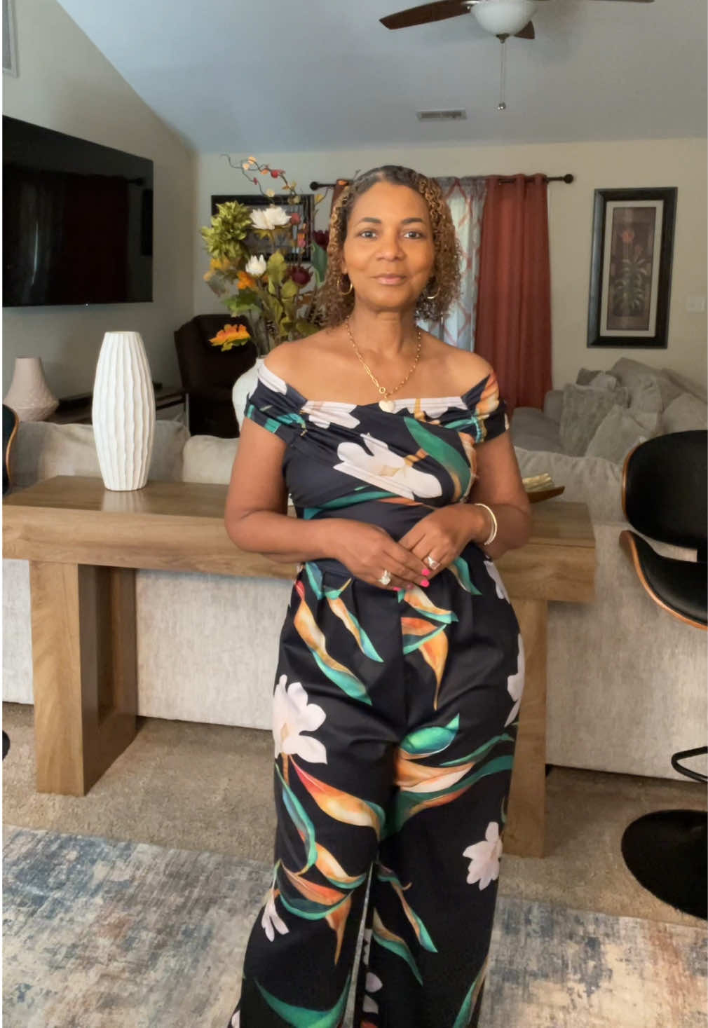 TikTok post by an influencer for Sylure. Caption reads: [...] off the shoulder Jumpsuit @Sylure....