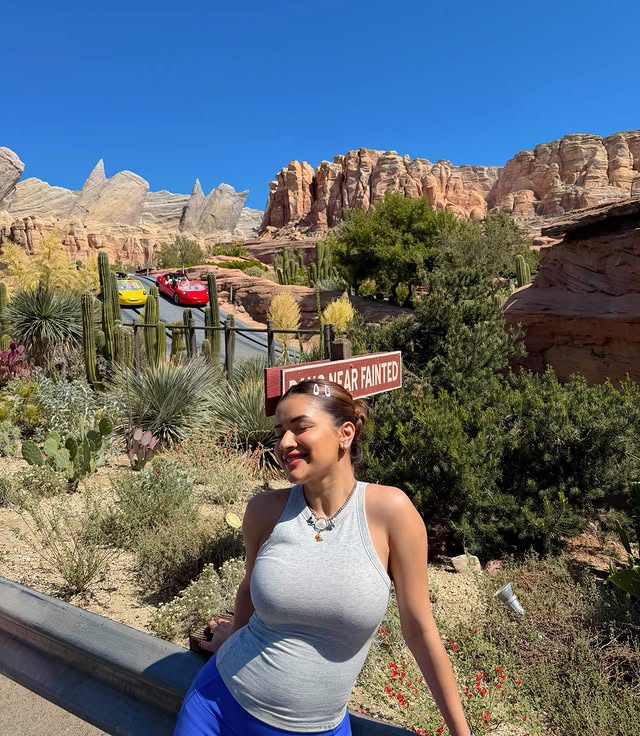 Instagram post by @avneetkaur_13 for Disneyland. Caption reads: [...] in California 💕🏰🎠🥰✨🧚🏻‍♀️🦄✨....