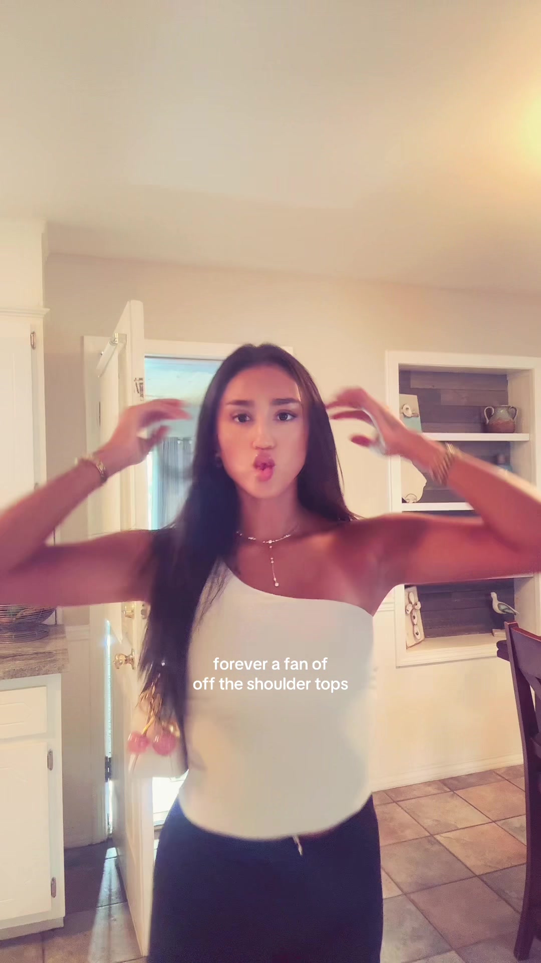 TikTok post by @clarabelleee_24 for MASKERT. Caption reads: @MASKERT GIRL #offtheshoulder #athleticwear [...].