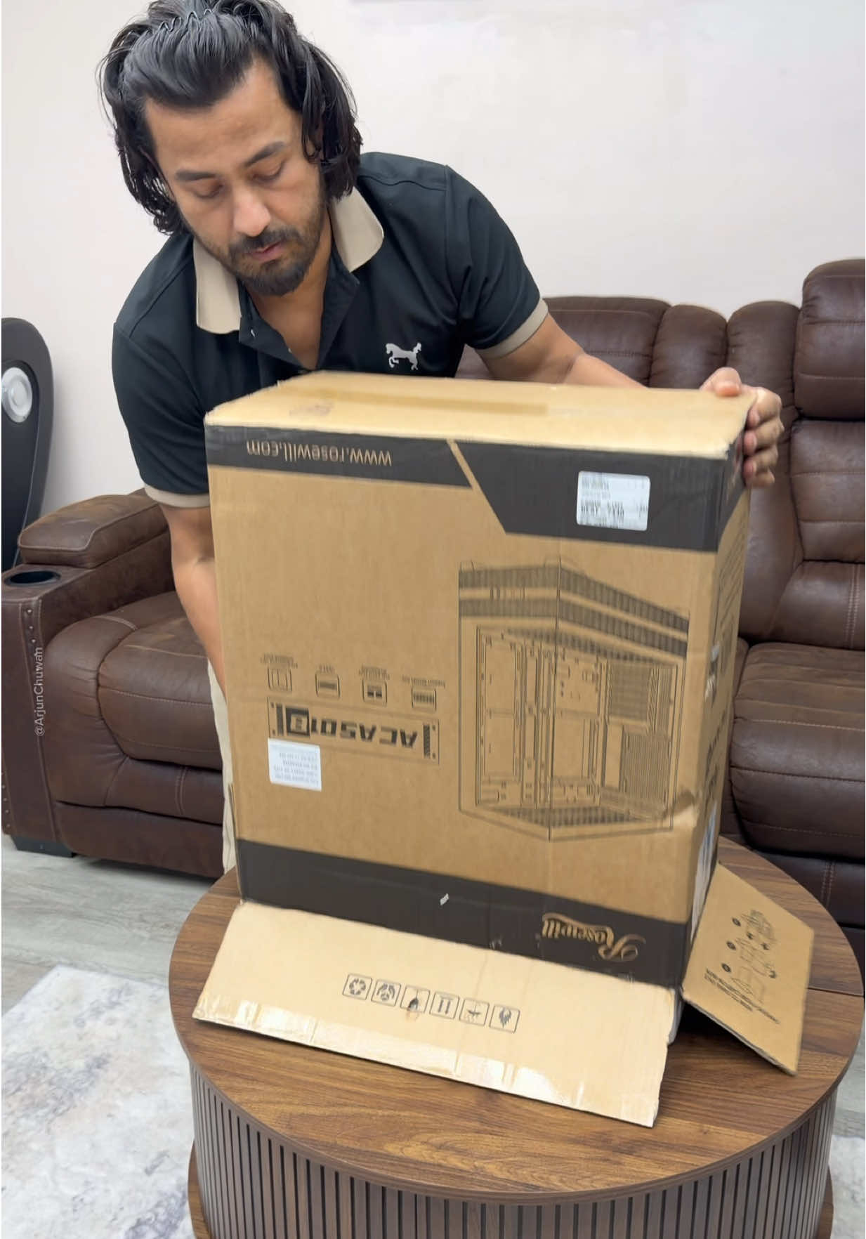 TikTok post by @arjunchuwan for Newegg. Caption reads: [...] #gamingpcbuild #computer #arjunchuwan....
