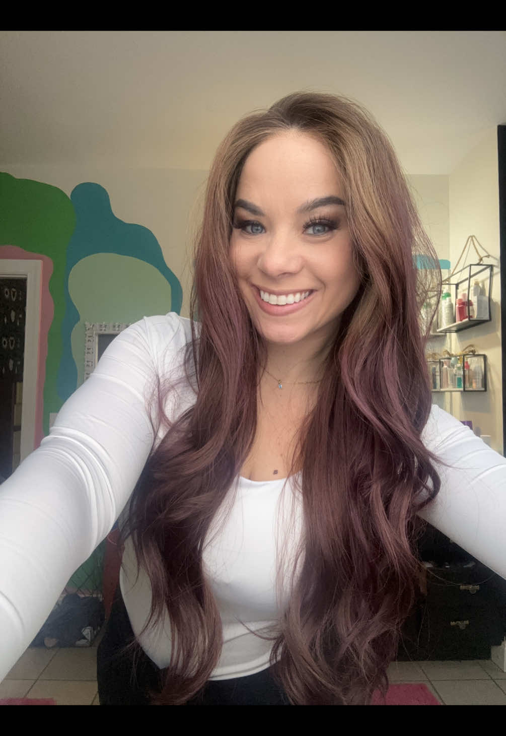 TikTok post by @elizabethwearswigs for Chelsey Smith Cosmetics. Caption reads: Zepplin wine berry from @Chelsey Smith Crowns....