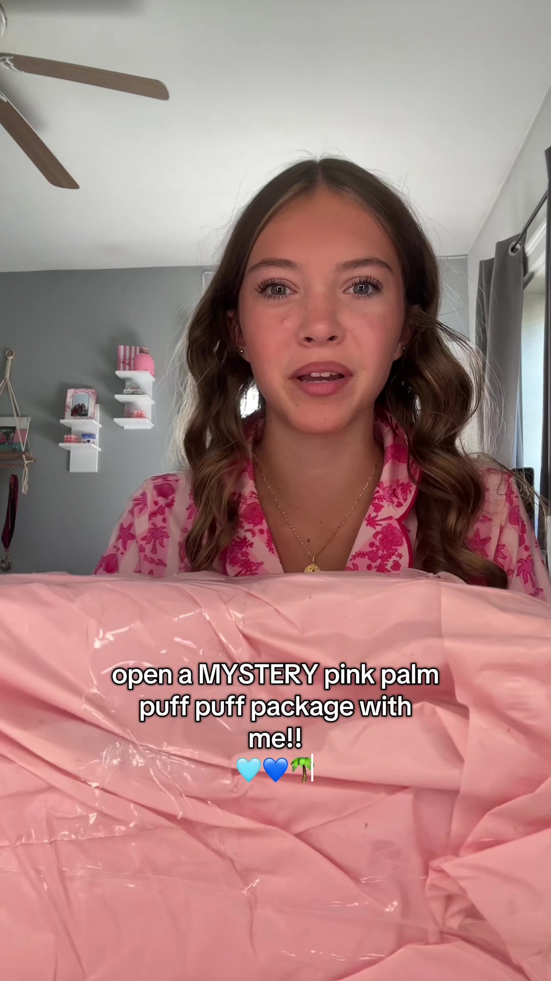 TikTok post by @.ella.elephant for PINK PALM PUFF. Caption reads: open a MYSTERY @PINK PALM PUFF package with me!!!....