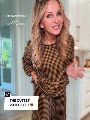 TikTok post by @tamara_tn for OmmigO. Caption reads: The plaid is giving me all the fall vibes, but the....