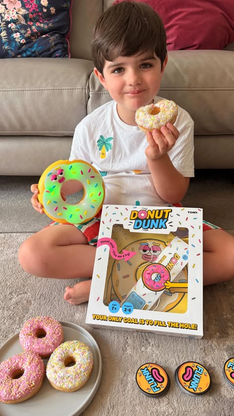 Instagram post by @mumma_andher_minis for TOMY. Caption reads: [...] an upgrade with Donut Dunk from @gamesbytomy....