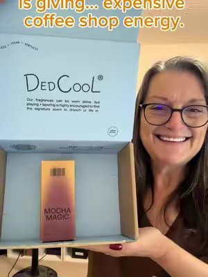 TikTok post by @deanna_fleek for DedCool. Caption reads: [...] scent… this would be it. 🤎🥛” @dedcool....