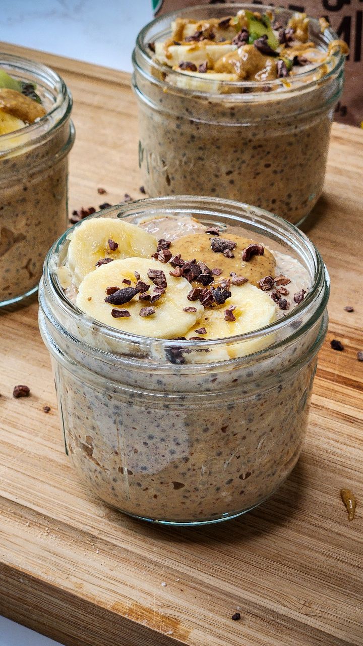 Instagram post by @bithealthier for EarthChimp. Caption reads: Creamy Almond Butter Protein Overnight Oats 🥣....