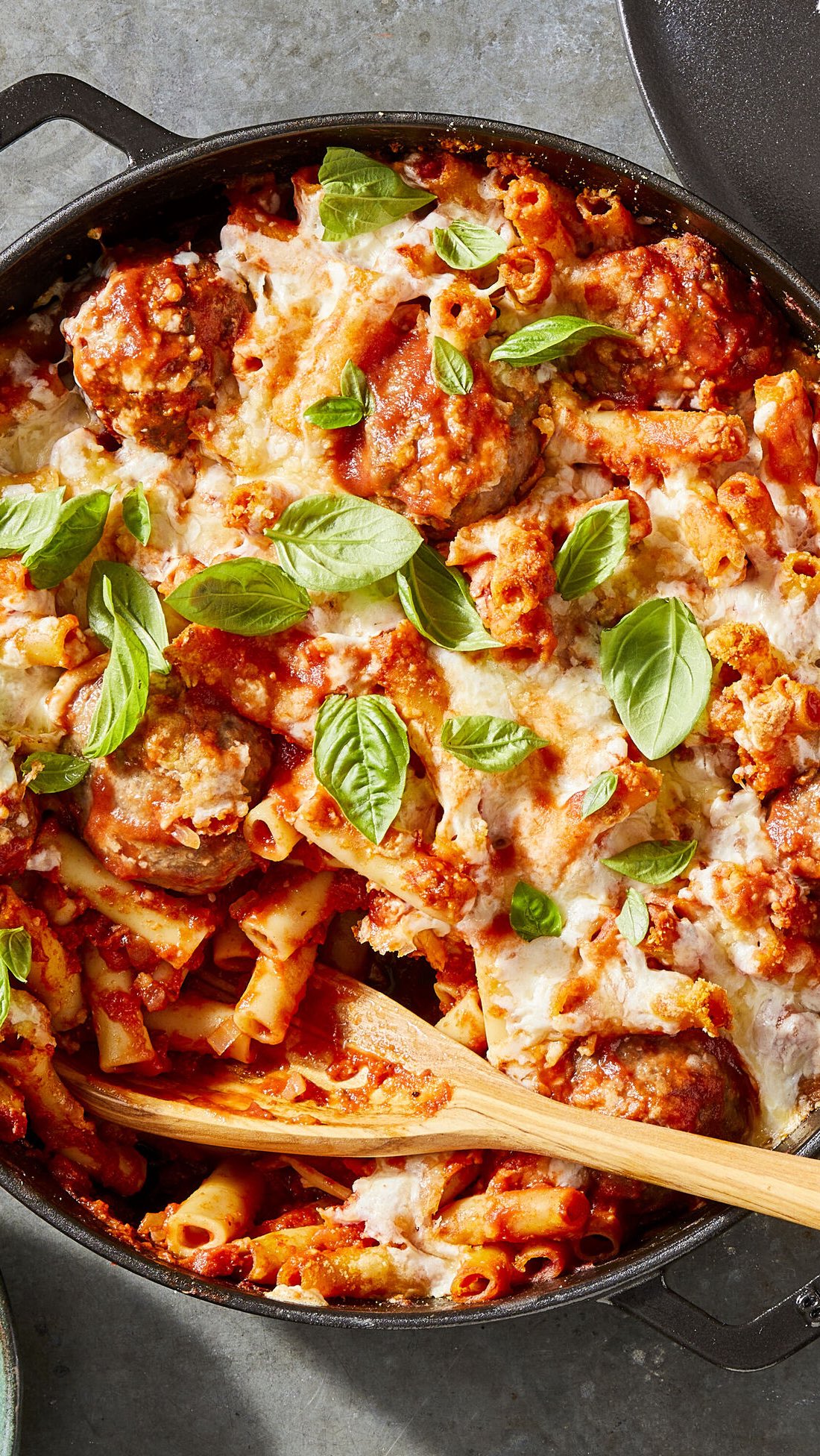 Instagram post by @smittenkitchen for Williams Sonoma. Caption reads: Choose between meatballs and baked ziti? We could....