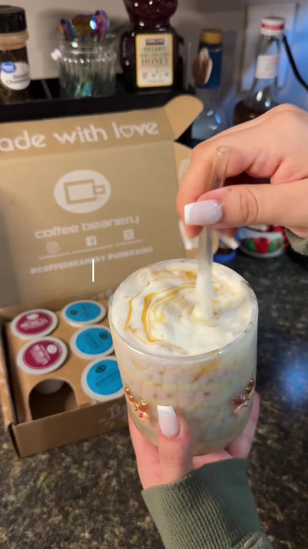 TikTok post by @lesliemichelleee for Coffee Beanery. Caption reads: [...] must try if you love coffee🍒🥥🥮☕️ @Coffee....