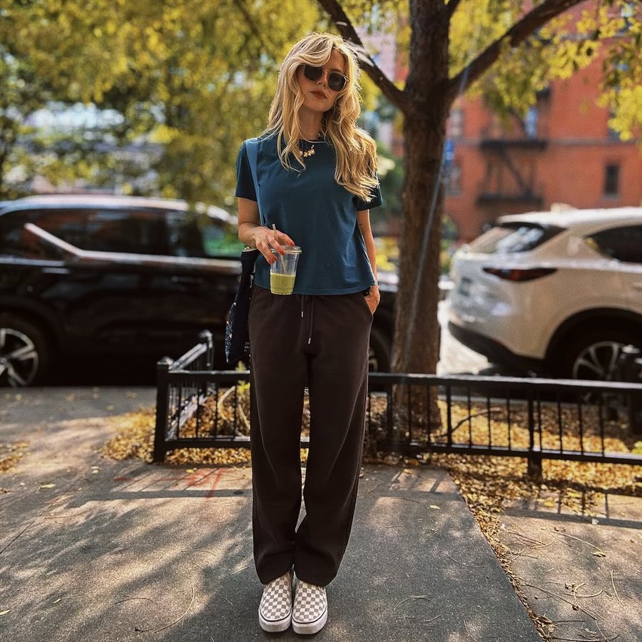 Instagram post by @therealagbarlow for Colorful Standard. Caption reads: just another nyc day in head-to-toe....