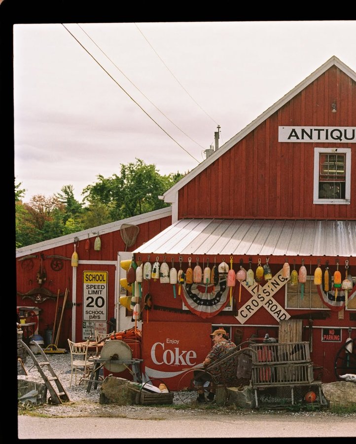 Instagram post by @expiredfilmclub for Visit Maine. Caption reads: Maine in fall, shot on film. #expiredfilmclub....