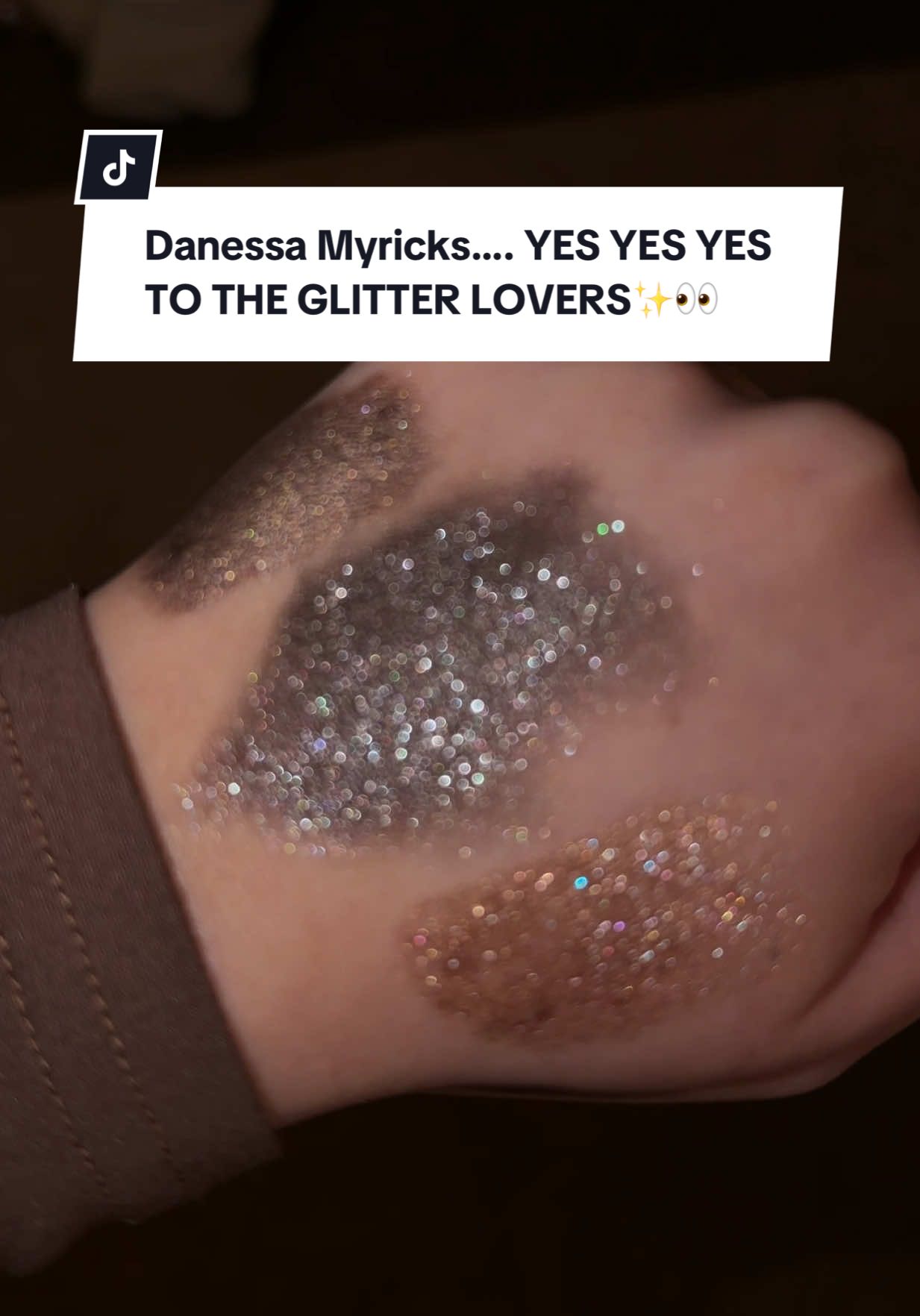TikTok post by @chantelleef for Danessa Myricks Beauty. Caption reads: Just a girl playing with glitter ✨🥹😭....