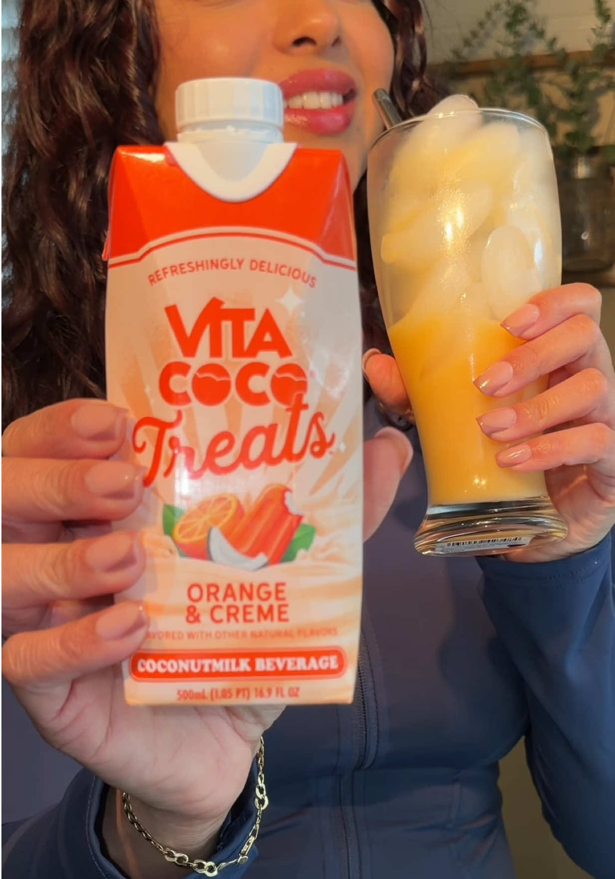 TikTok post by @yessigill for Vita Coco. Caption reads: [...] nostalgia in a sip. Vita Coco Orange & Cream....