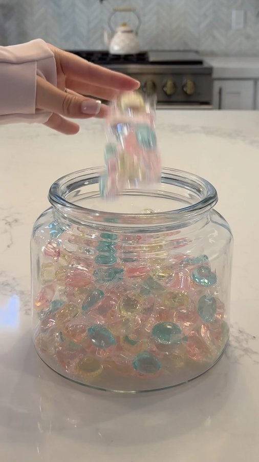 Instagram post by @mikayla.mcneany for Health-Ade Kombucha. Caption reads: Pink home restocks! 💓🫧🎀🌸👛💄🦩🩰 Which restock....