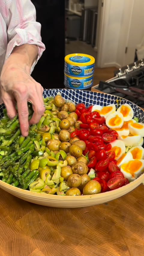 Instagram post by @seattlehanddoc for Wild Planet Foods. Caption reads: [...] spring salad for lunch. We love....