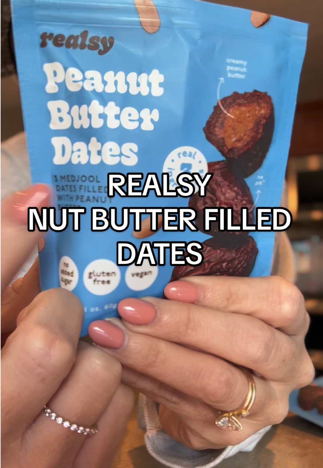 TikTok post by @caitlingrayowren for Realsy. Caption reads: Replying to @jdavis3741 👏🏻👏🏻👏🏻 @realsy foods....