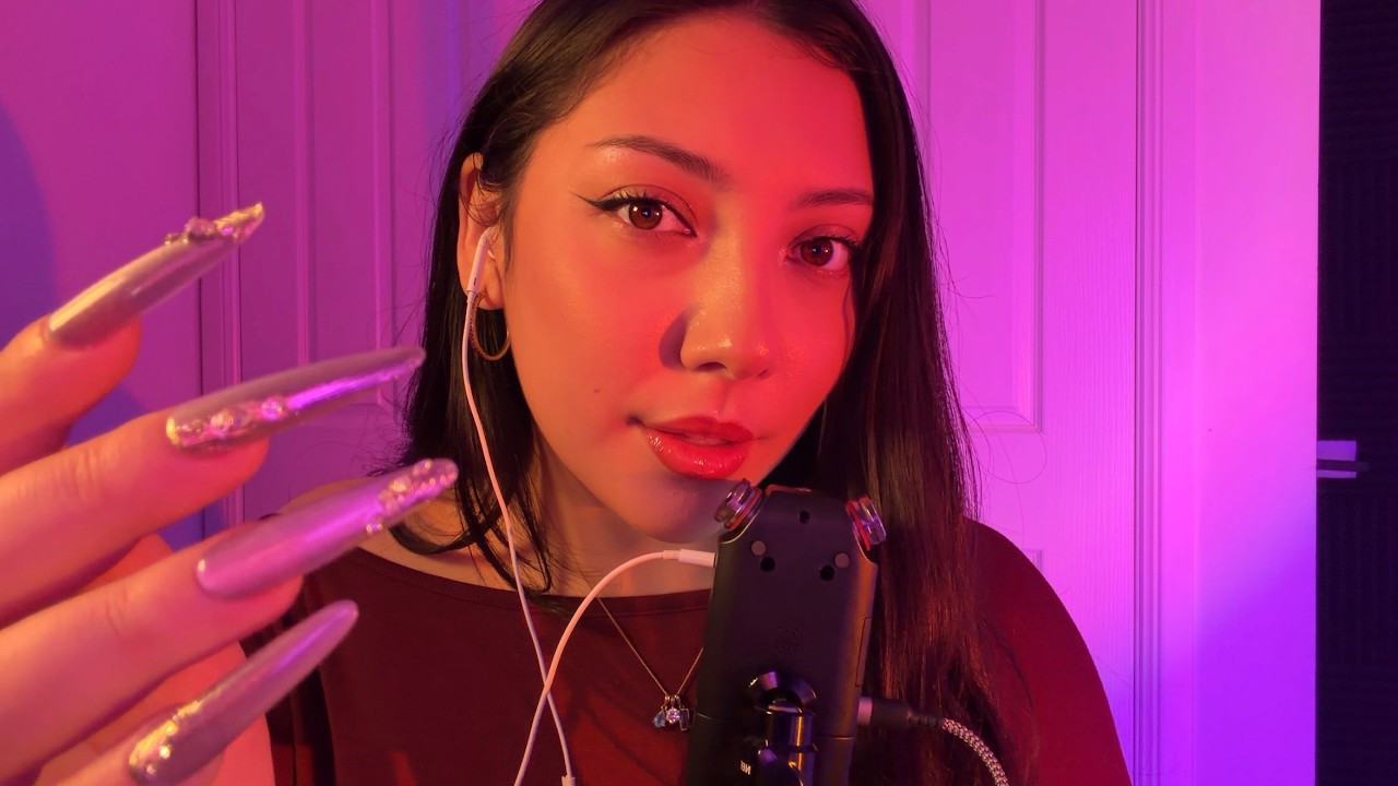 YouTube post by @ASMRJADE for The Oodie. Caption reads: 1 Hour of ASMR with... Mouth Sounds (No Looping)....