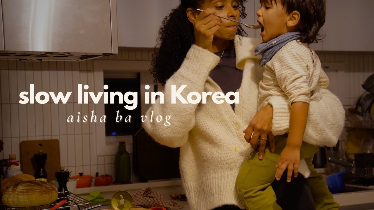 YouTube post by @AishaBa for Wishtrend. Caption reads: Slow Autumn Days in Korea | Cooking, Bread Baking....