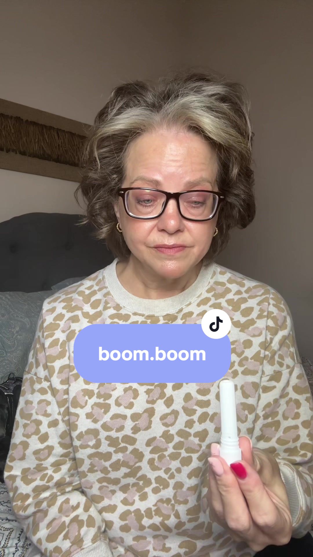 TikTok post by @christyconradfeld for BoomBoom Naturals. Caption reads: I need a wake up call! Help me boom boom!....