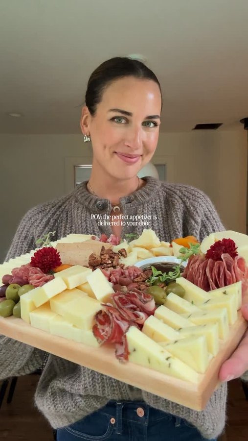 Instagram post by @thatcheeseplate for Cabot Creamery Cooperative. Caption reads: THE BEST CHEESY HOLIDAY & HOSTESS GIFT ✨ My custom....