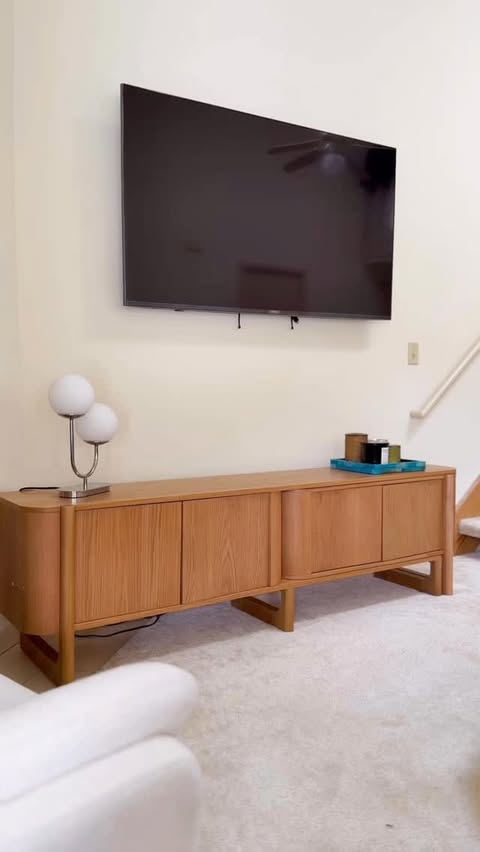Instagram post by @heyitsm3rv3 for Houlte. Caption reads: [...] 🤍 The Silas Extendable TV Stand by....