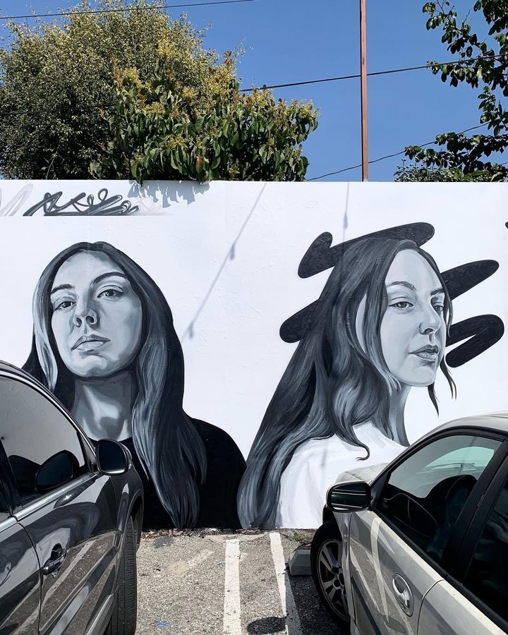 Instagram post by @dayinla for Secret Walls. Caption reads: [...] share #two walls located over at....