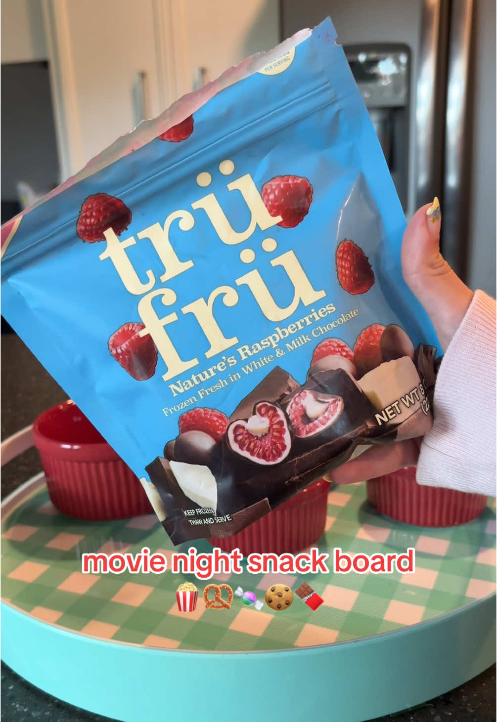 TikTok post by @simply_emily8 for Tru Fru. Caption reads: [...] #snacktok #charcuterie #healthydessert....