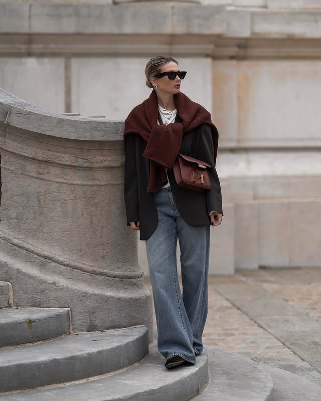 Instagram post by @kathrinbommann for The Row. Caption reads: Touch of burgundy… 🥀 [Anzeige] #ootd....
