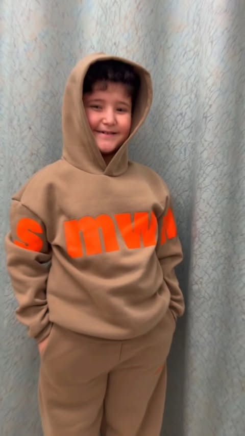 Instagram post by @nadaashrafofficiall for Shein. Caption reads: خلّي أولادكم يختاروا ملابسهم منSHEIN 👀عندهم....