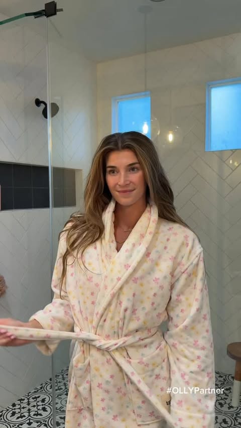 Instagram post by @katiebrueckner for OLLY. Caption reads: Shower reset 🧼🌧✨ #OLLYPartner

Wet January for....