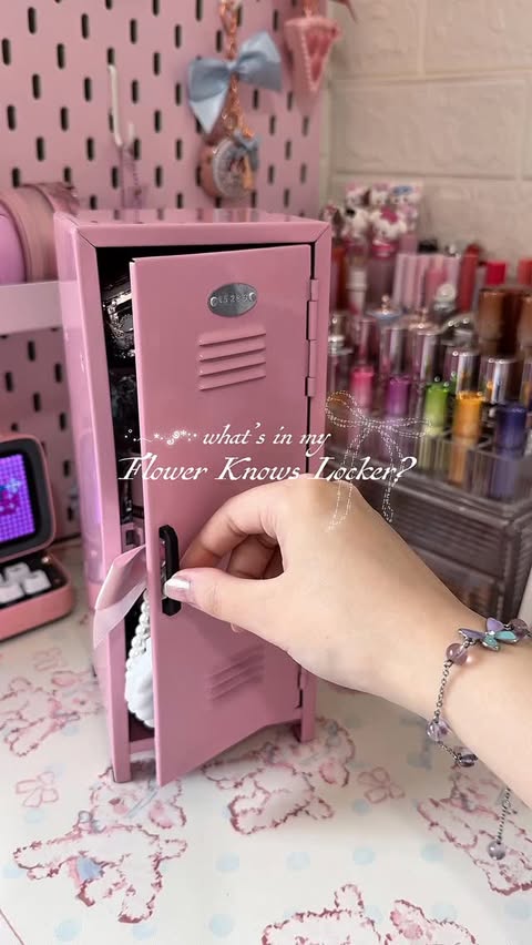 Instagram post by @peachyasay for Flower Knows. Caption reads: [...] 𐙚 ˚₊ · what’s in my pink locker with....