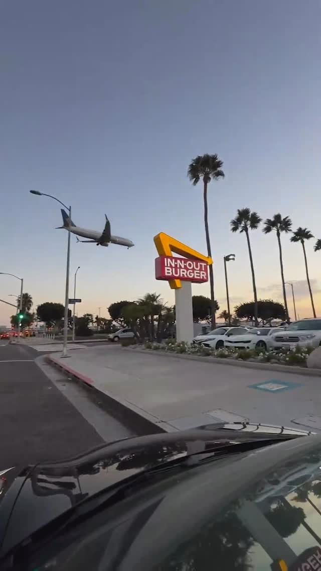 Instagram post by @karim_ghaly for Discover Los Angeles. Caption reads: 🎥: @karim_ghaly Best place to plane spot ✈️....