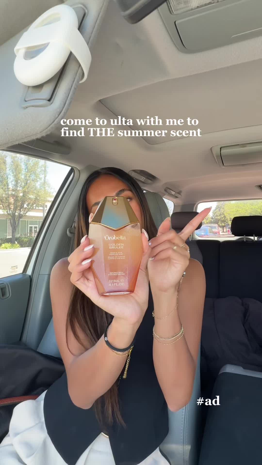 TikTok post by @alexisdimaya for Orebella. Caption reads: [...] and made for summer. 🤎 @Bella Hadid....