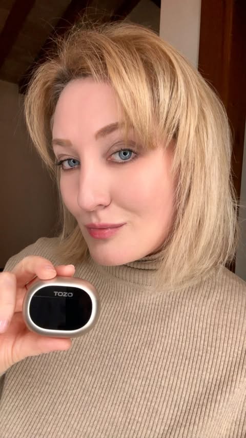 Instagram post by @katrinamolini for TOZOSTORE. Caption reads: My new earbuds from @tozo_official are so cool!!!....