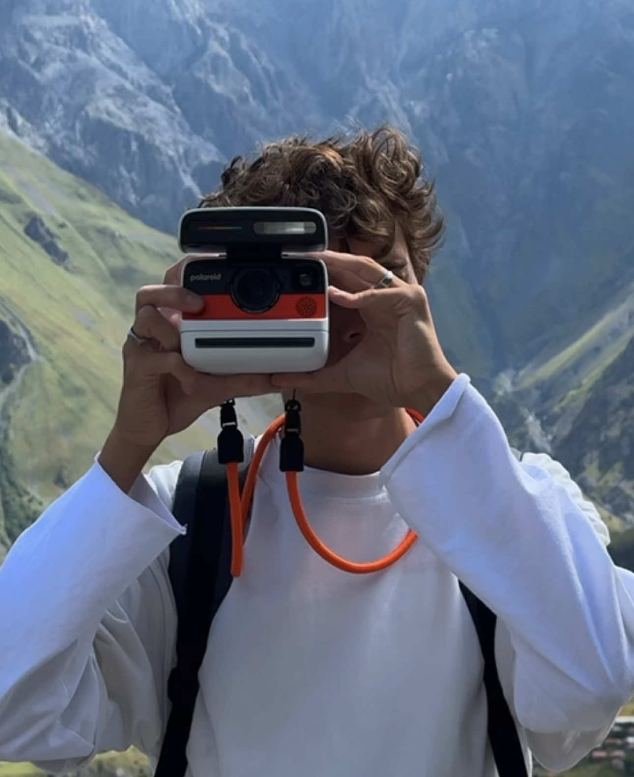 TikTok post by @smthrndmm for Polaroid. Caption reads: some days deserve more than just a photo on your....