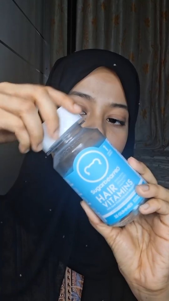 Instagram post by @nadyaaaugc for SugarbearPRO. Caption reads: Healthy hair starts with tasty @sugarbearpro hair....