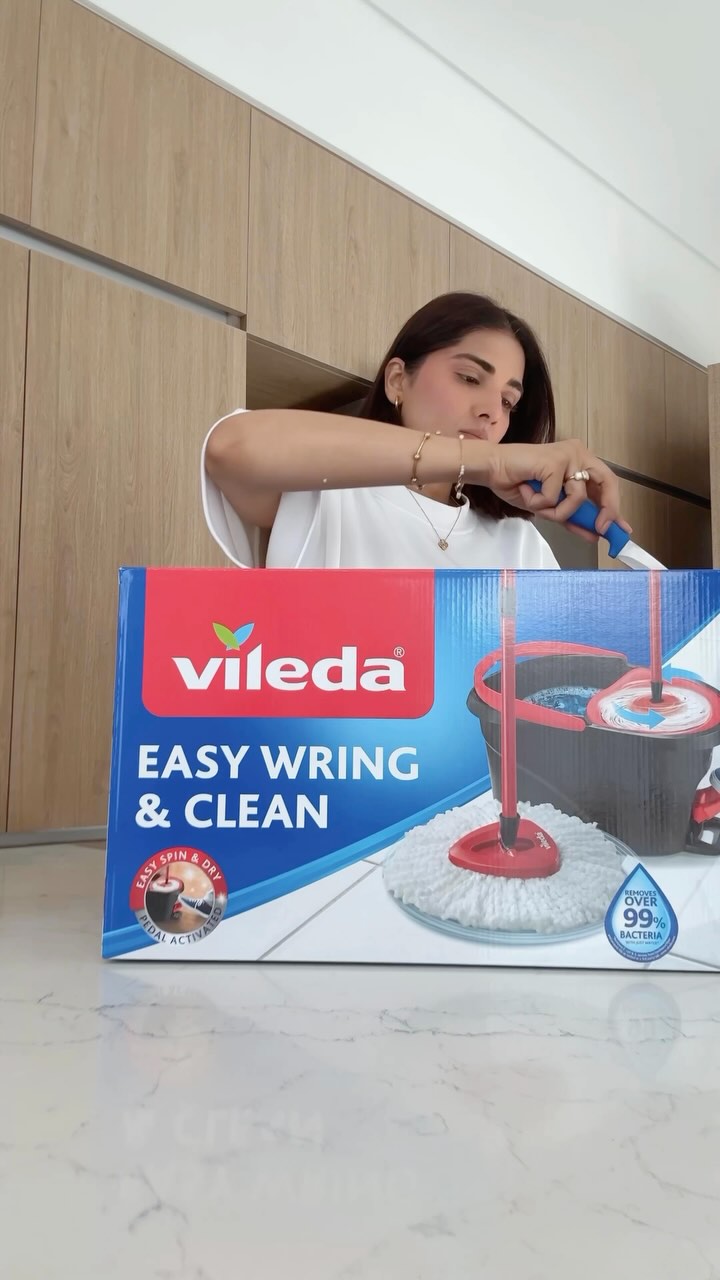 Instagram post by @mom_in_dubai for Vileda. Caption reads: Meet my cleaning sidekick: the Vileda Easy Wring &....