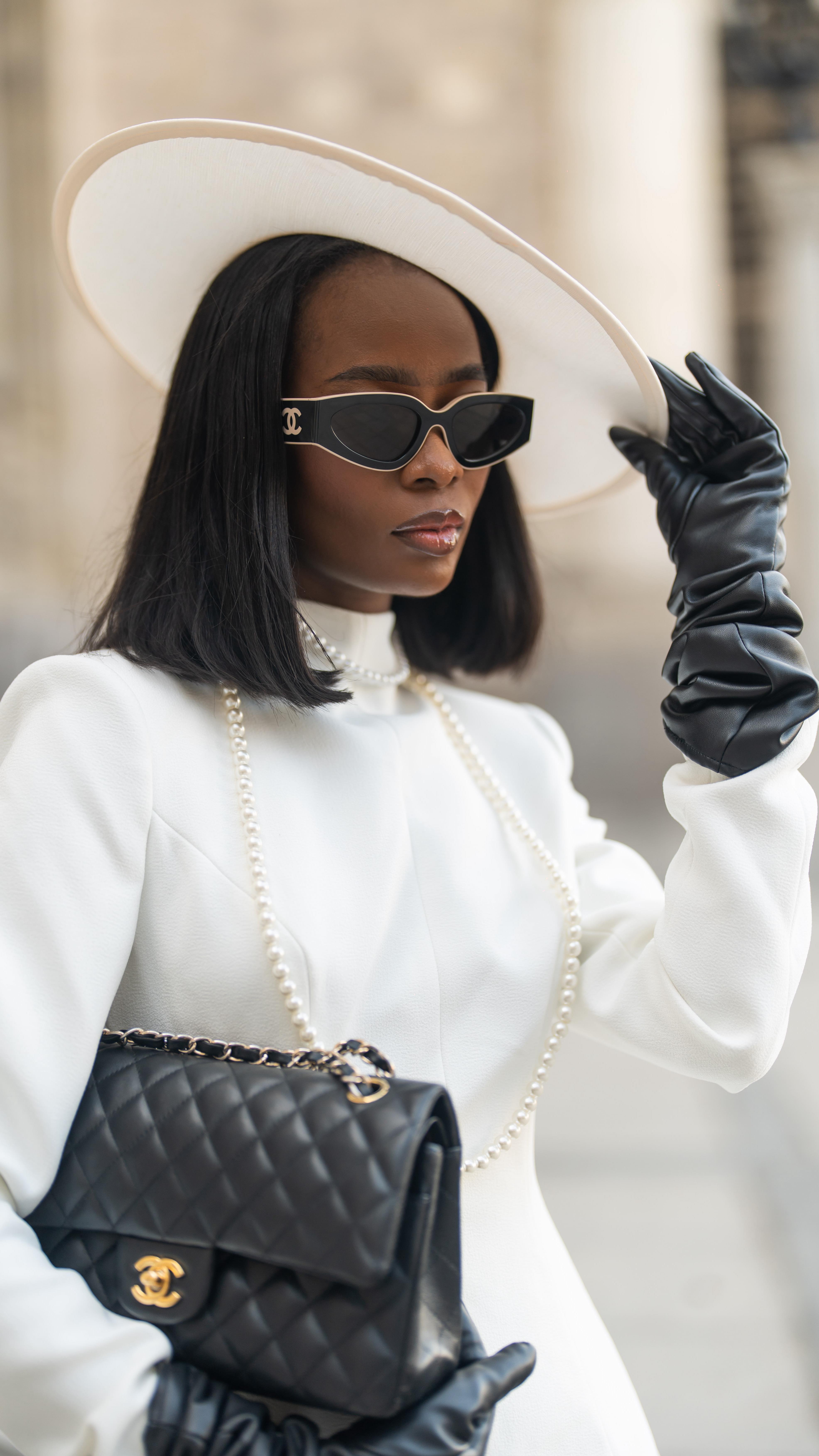 Instagram post by @alicia_hadid_mukuna for Club L London. Caption reads: A gesture, a glance, an aura that’s sophistication....