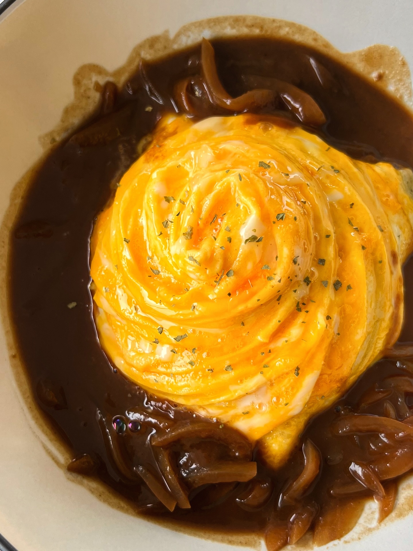 Instagram post by @eatingwithkirby for Get Cracking. Caption reads: Japanese Egg Tornado HACK with a fork! 🍳 #ad....