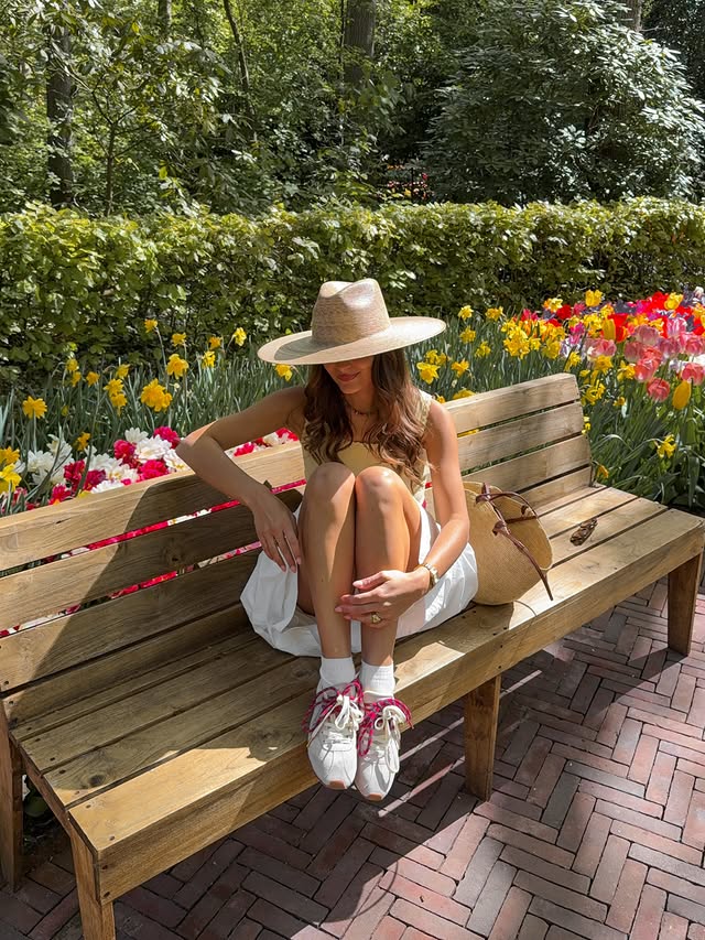 Instagram post by @adelinerbr for Victoria Shoes. Caption reads: Tulip season in Amsterdam with @victoria_shoes 🌷....