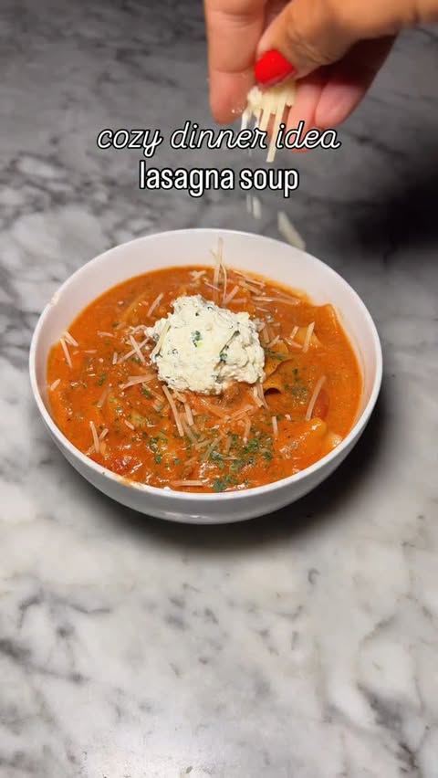 Instagram post by @pretty_collected for Kettle & Fire. Caption reads: Cold nights call for cozy dinners and lasagna soup....