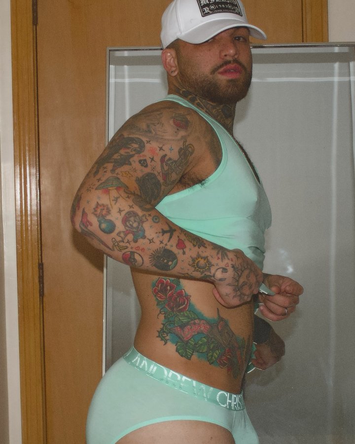 Instagram post by @thiago.morare for Andrew Christian. Caption reads: Because feeling good should always come first.....