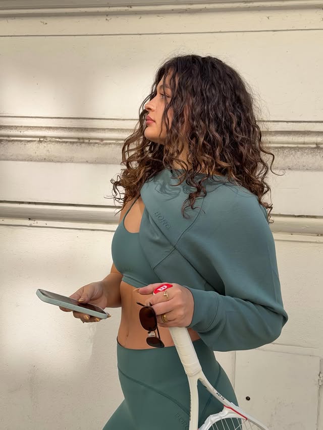 Instagram post by @merlelli for Björn Borg. Caption reads: i like my greens on me 🍏🥬 full look is the new....