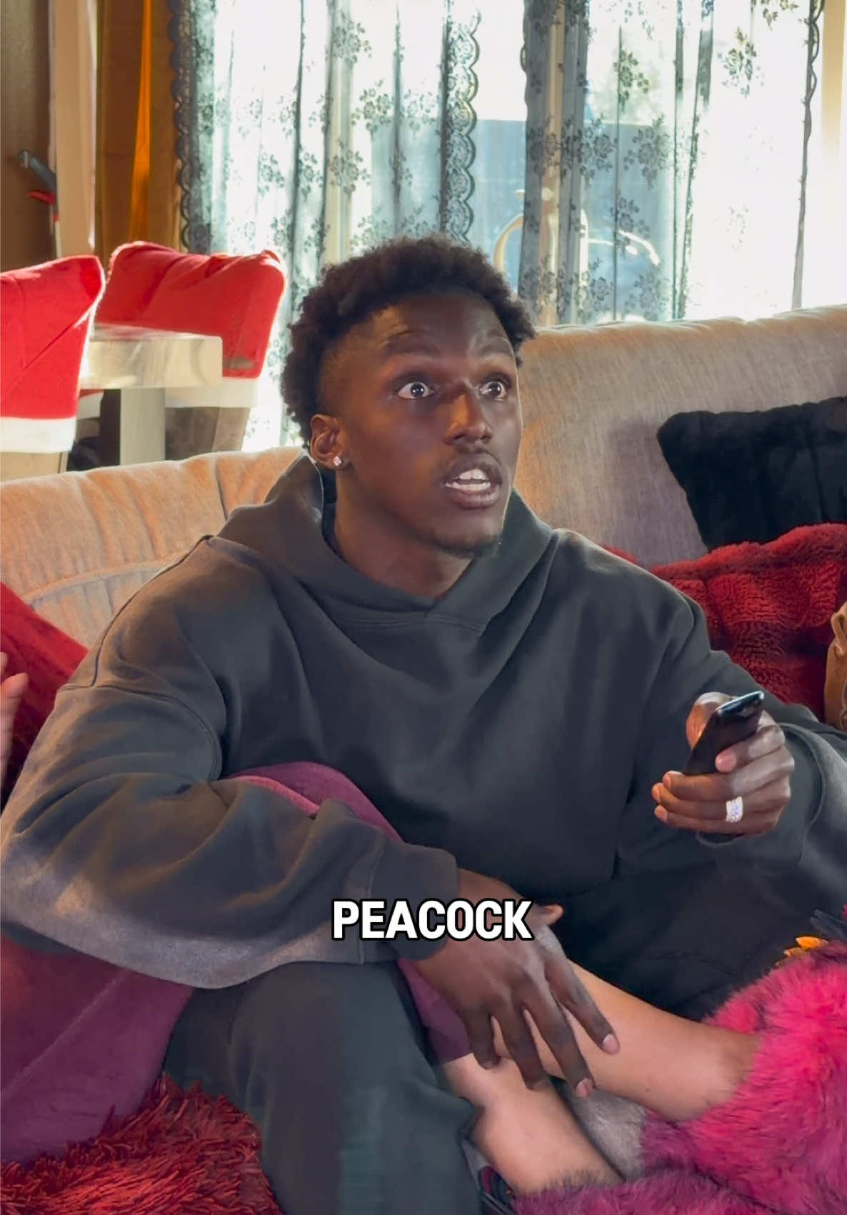 TikTok post by @hamilt0njr for Peacock TV. Caption reads: #PeacockPartner Debating what to watch is always a....