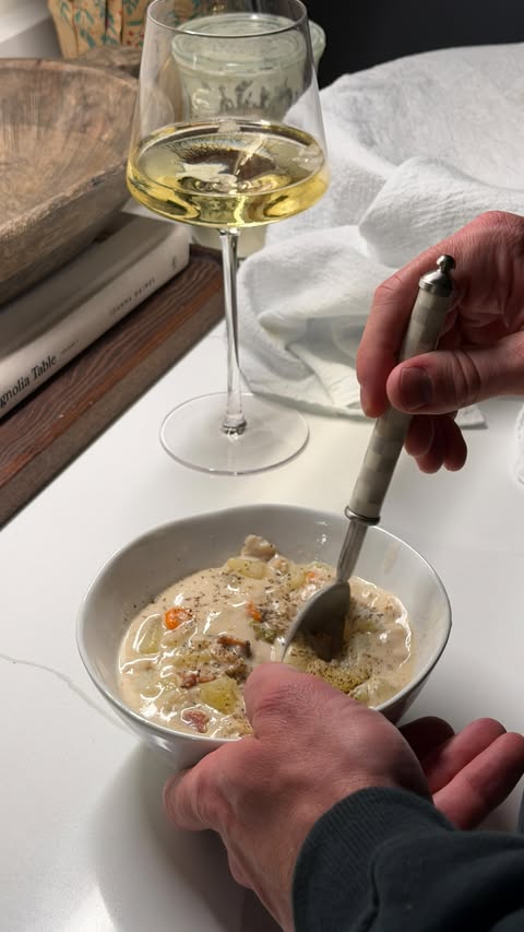 Instagram post by @daniellewellnesss for Caraway Home. Caption reads: Clam Chowder; for the winter nights you don’t know....