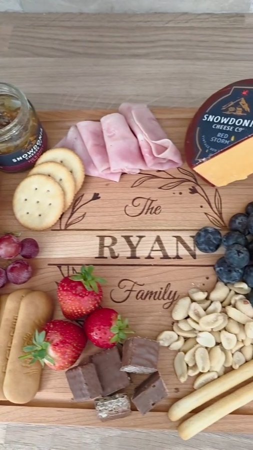 Instagram post by an influencer for Callie Gifts. Caption reads: [...] this Charcuterie board from @calliegifts the....