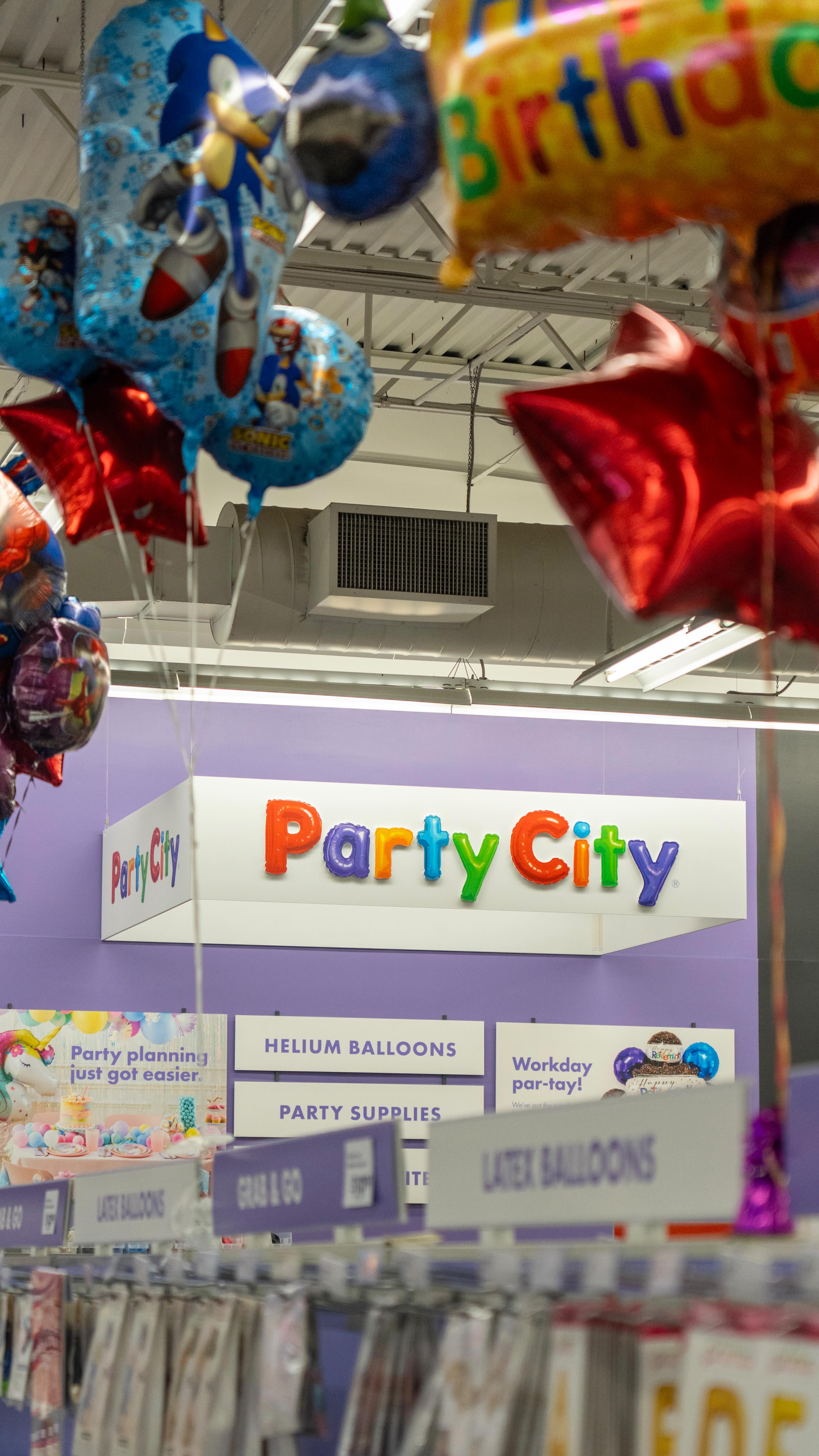 Instagram post by @joyfoodboston for Party City. Caption reads: Did you know you can get party supplies at Staples....